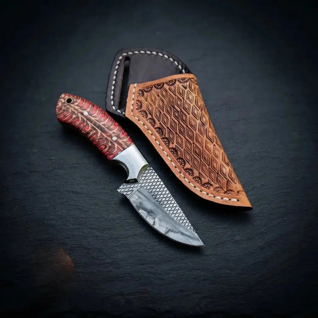 Pinecone and resin handle skinner knife with steel bolster, 6 inch fixed blade