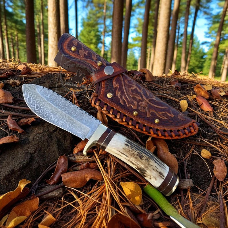 Hand-Forged Damascus Steel Knife: Antler Handle, Leather Sheath
