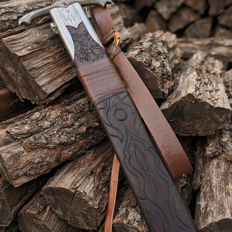 Full length view of the Damascus longsword and sheath