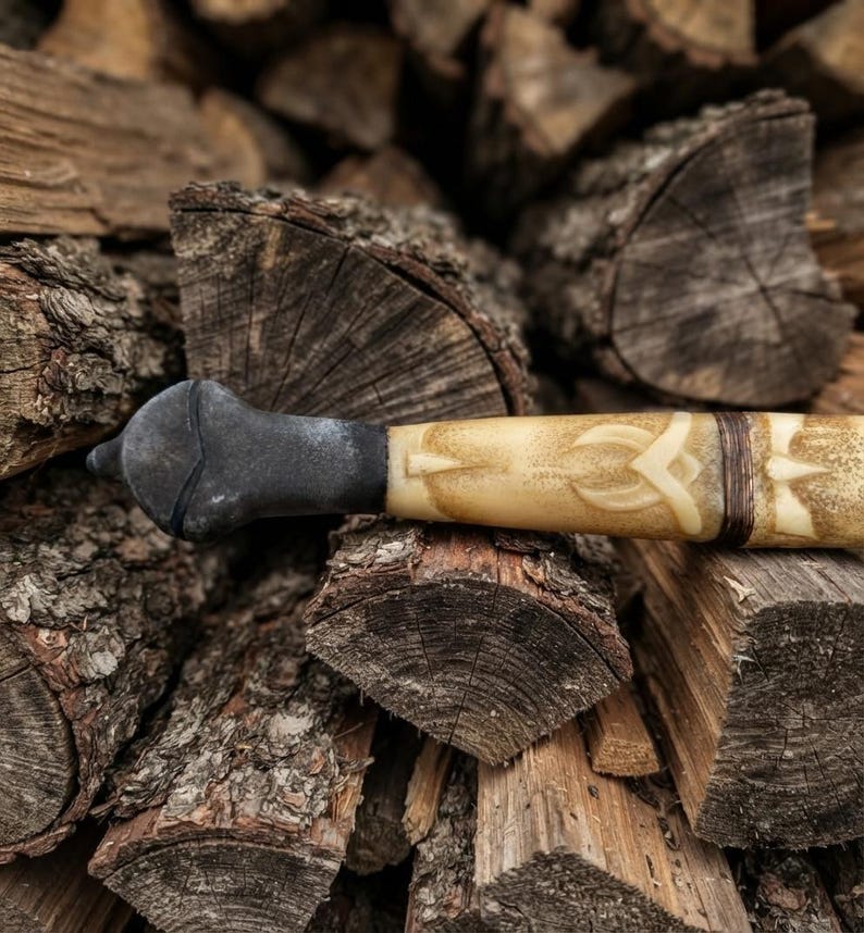 Close-up of the Damascus steel blade pattern on the longsword
