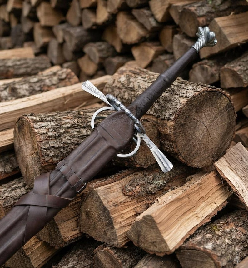 Leather-wrapped grip detail on the Renaissance longsword