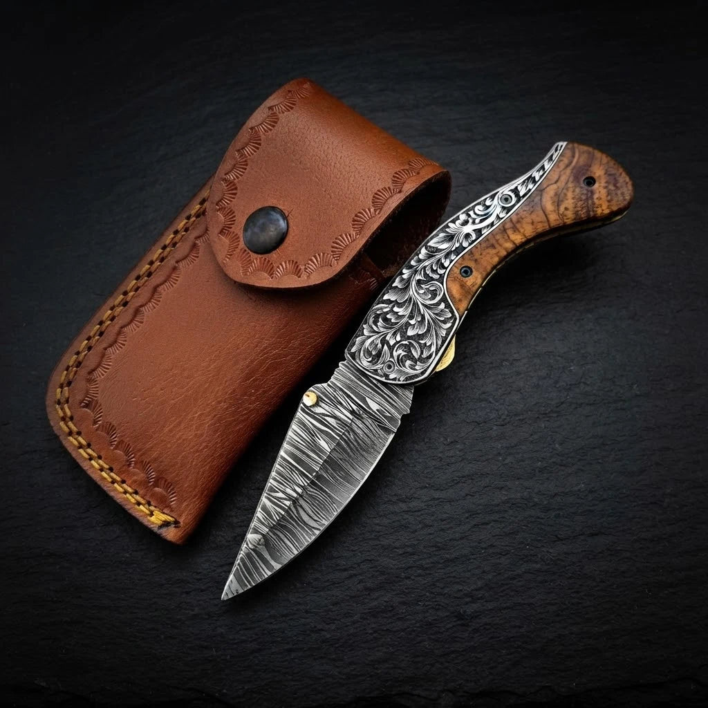 Olive wood folding pocket knife with hand-engraved steel bolster