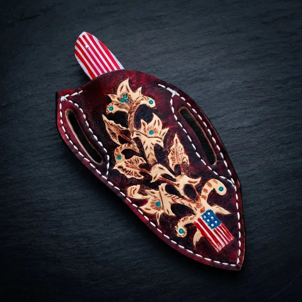 High-carbon Damascus cowboy knife with stars and stripes resin handle and hand-stitched sheath