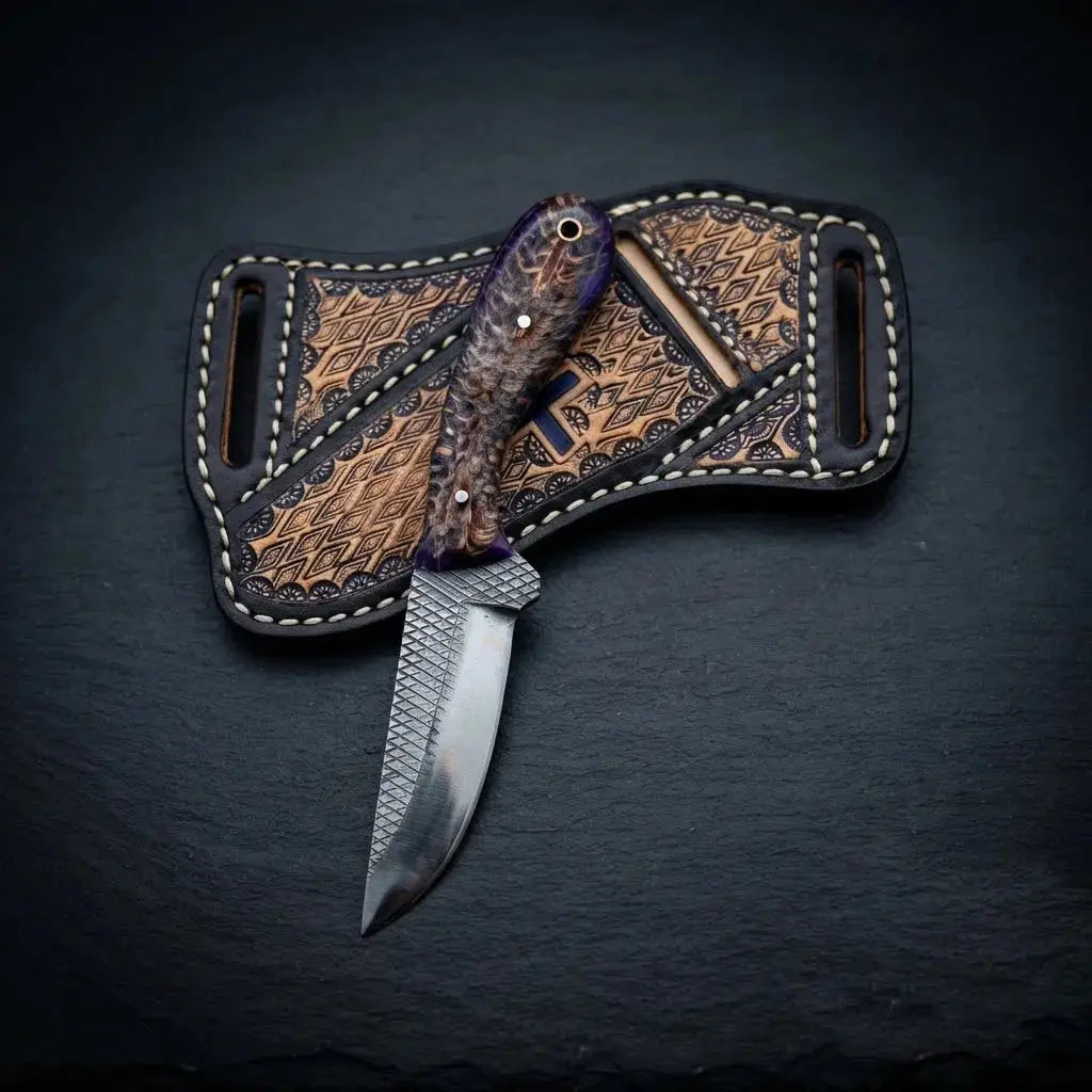 Resin and pinecone knife handle with steel bolster on western skinner knife