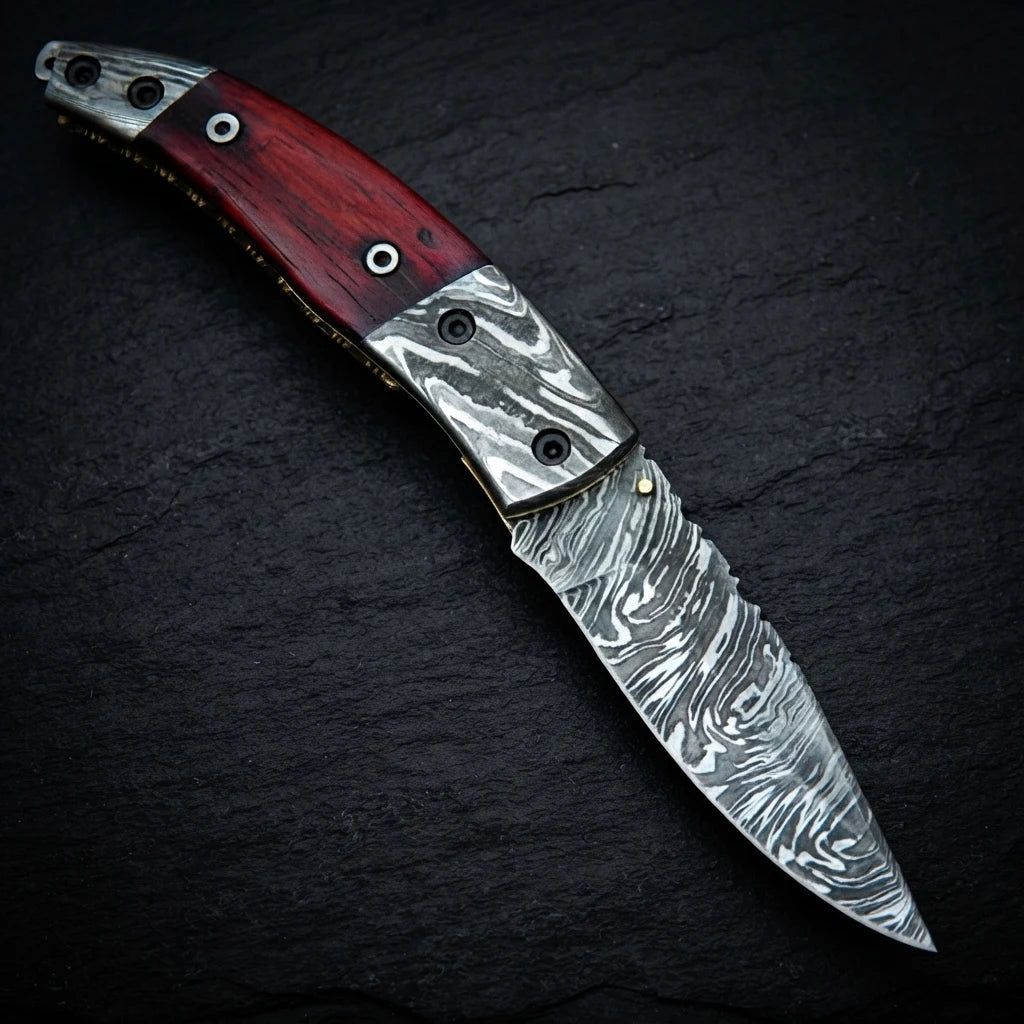 Damascus folding pocket knife with red blood wood handle