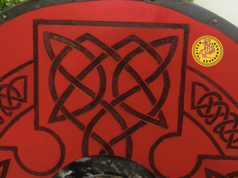 Red Viking Shield, handcrafted Celtic knot wood decor – solid wood base with metal center boss
