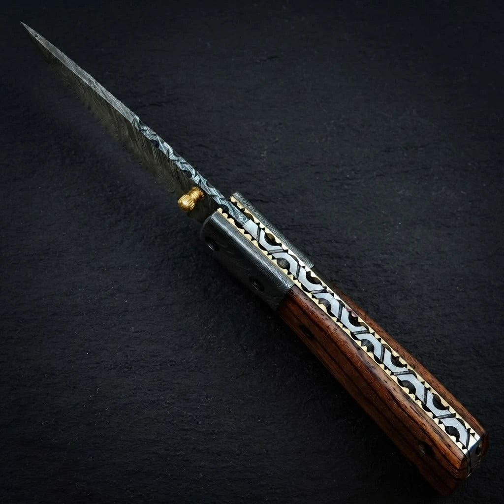 Damascus folding knife folded closed