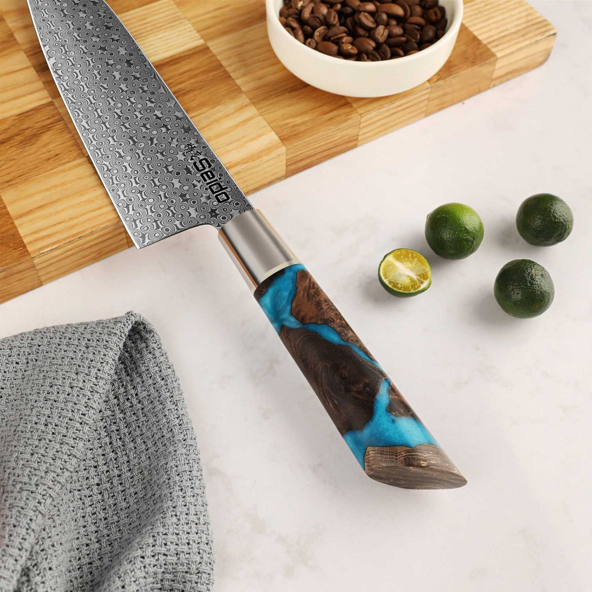 Shinko 110-layer Damascus gyuto knife with polished bolster