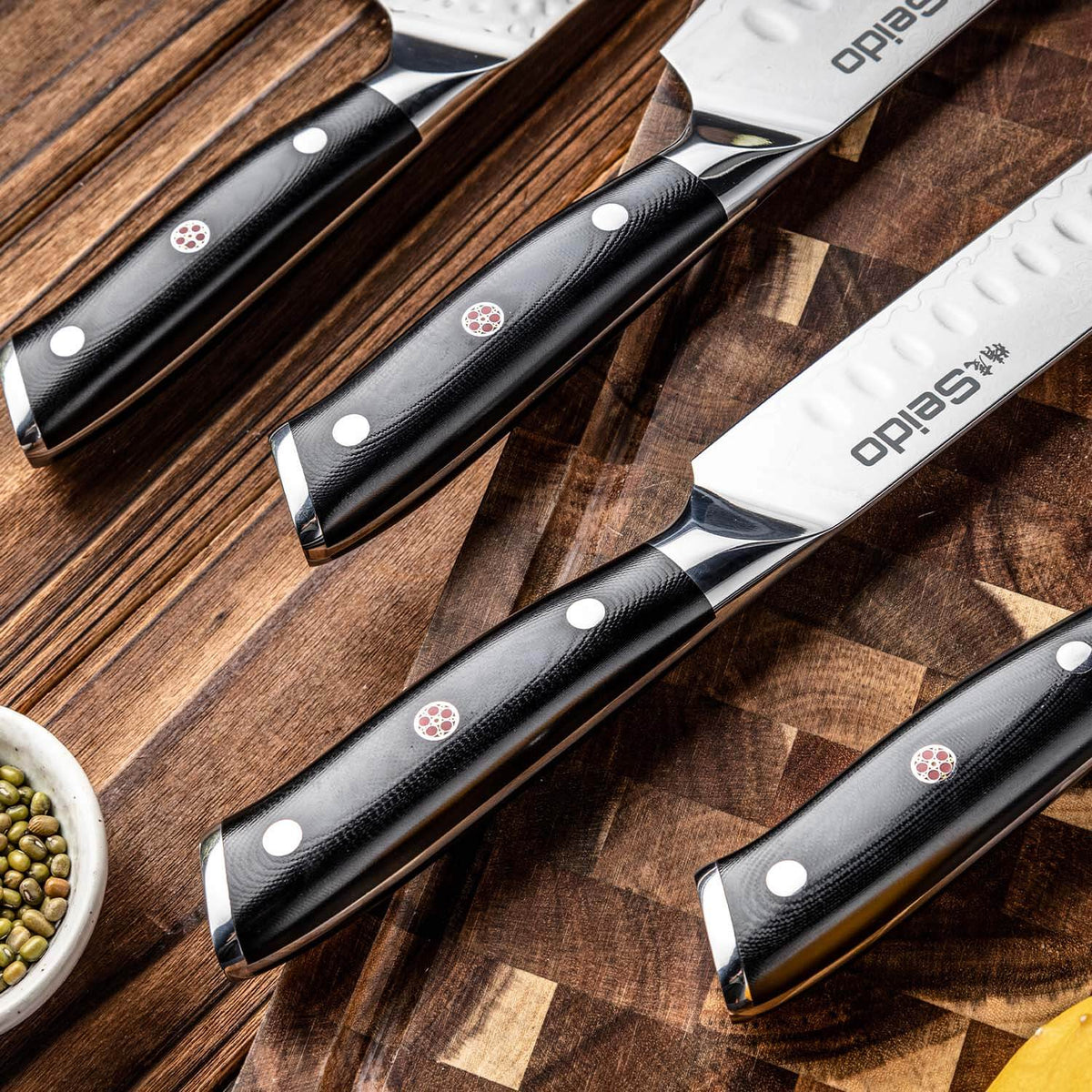 Shujin Damascus butcher knife with black G10 handle