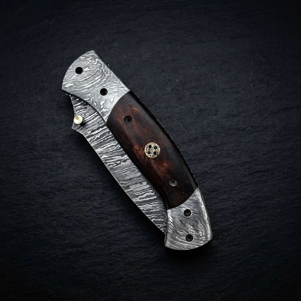 Damascus tanto folding knife with camel bone handle and double Damascus bolster – folded with sheath