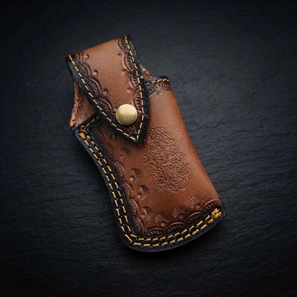 Damascus tanto folding knife with camel bone handle and double Damascus bolster – handle detail