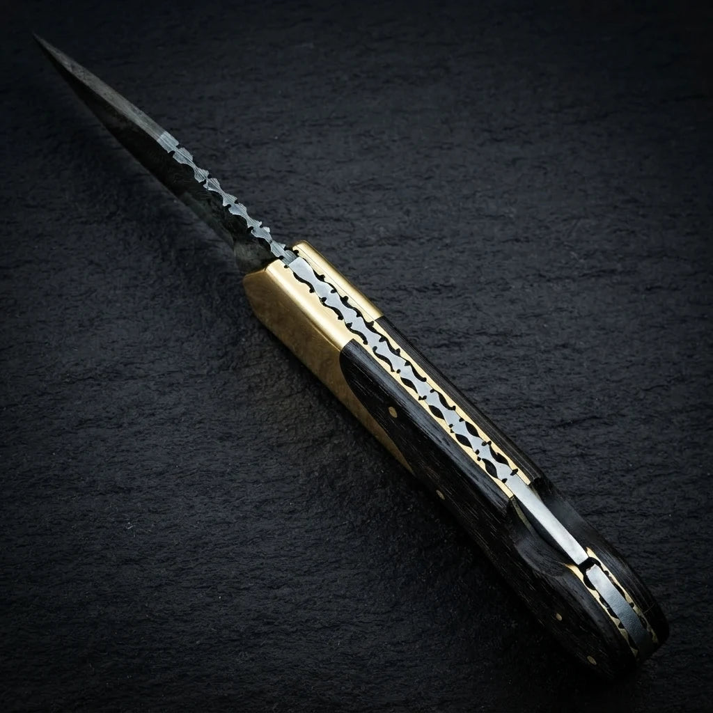 Damascus folding knife folded closed